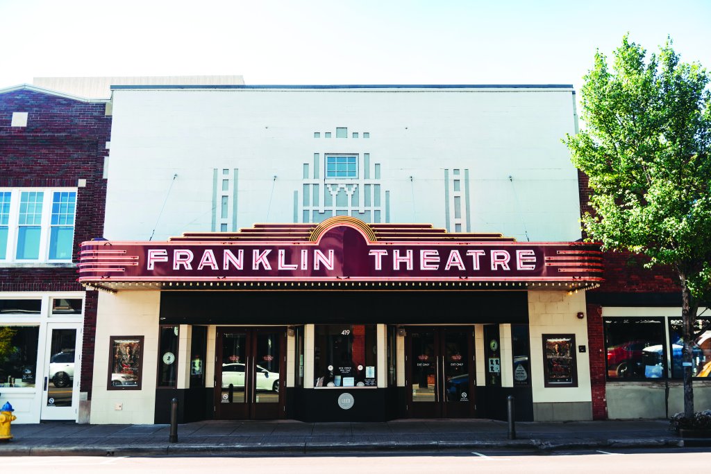 Franklin, Tennessee's Preservation Success Story The Franklin Theatre, a vintage movie theater with a distinctive Art Deco marquee, stands prominently on a street corner in Williamson County, Tennessee.