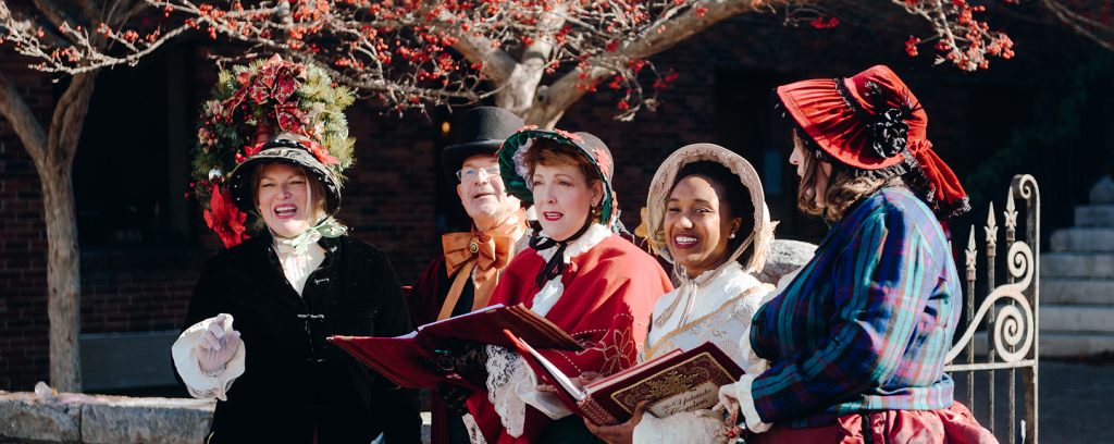 Dickens of a Christmas A group of five women dressed in Victorian-era costumes sing carols outdoors in Williamson County, Tennessee.